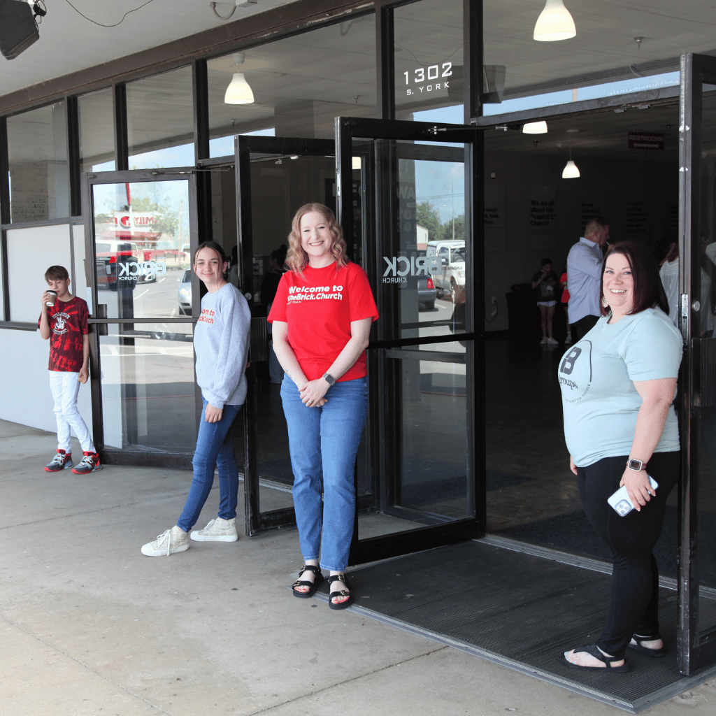 greeters opening door